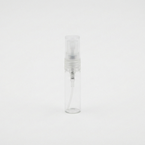 Clear glass bottle with a white cap on a white background